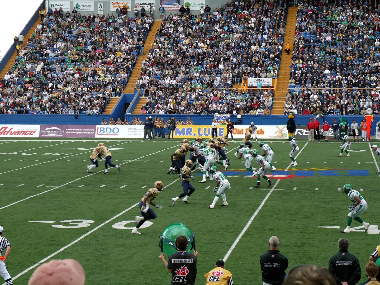 Winnipeg Blue Bombers and Saskatchewan Roughriders players during a game at Canad Inns Stadium.