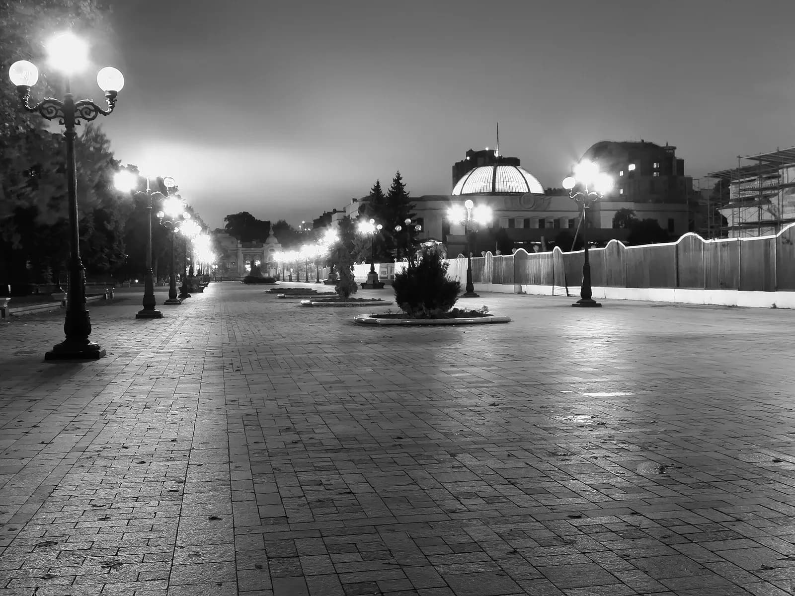 The Verkhovna Rada parliament building at Constitution Square in Kyiv at night.