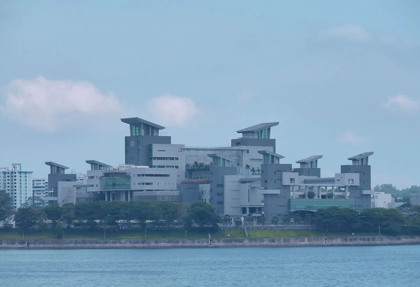 Woodlands Checkpoint at the Singapore end of the Johor–Singapore Causeway, viewed from Malaysia.