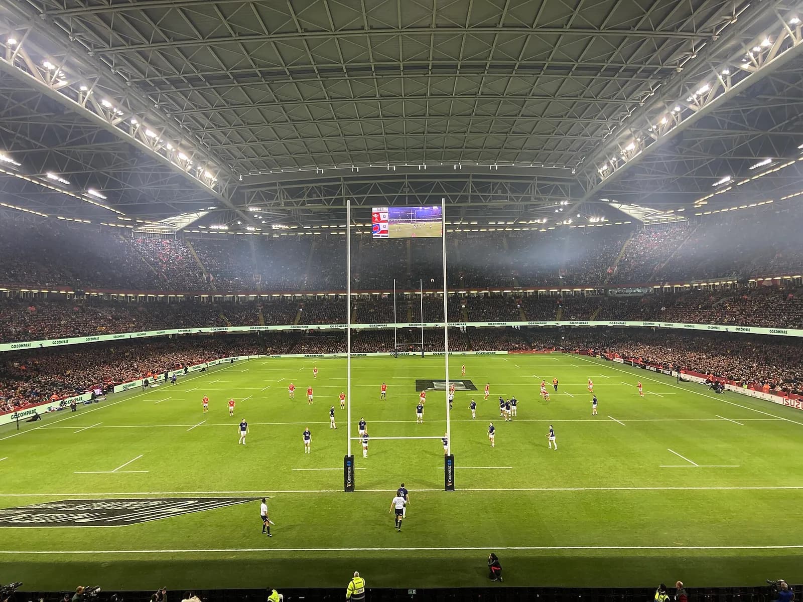 Wales and France rugby teams playing at Principality Stadium in Cardiff.