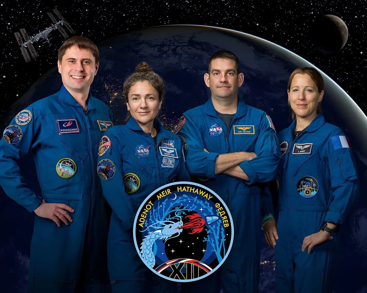 Crew-12 members Andrey Fedyaev, Jessica Meir, Jack Hathaway and Sophie Adenot pose together for an official portrait.