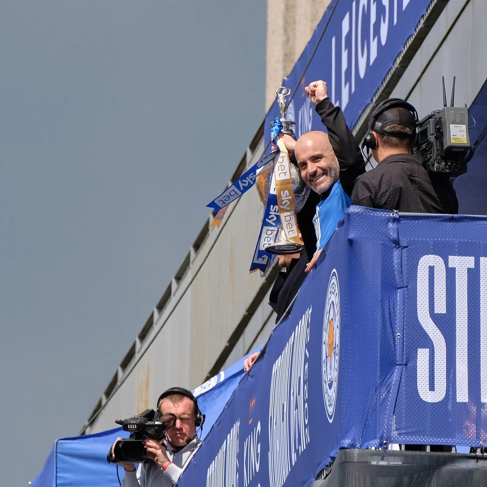 Enzo Maresca lifts the Championship trophy during Leicester City’s promotion parade.