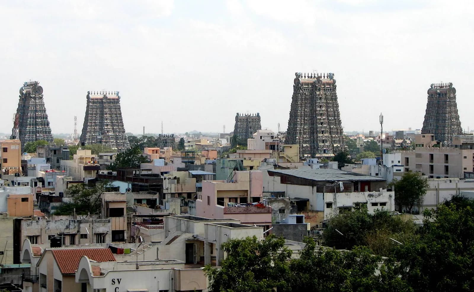 Gopurams of the Meenakshi temple seen above the city of Madurai.