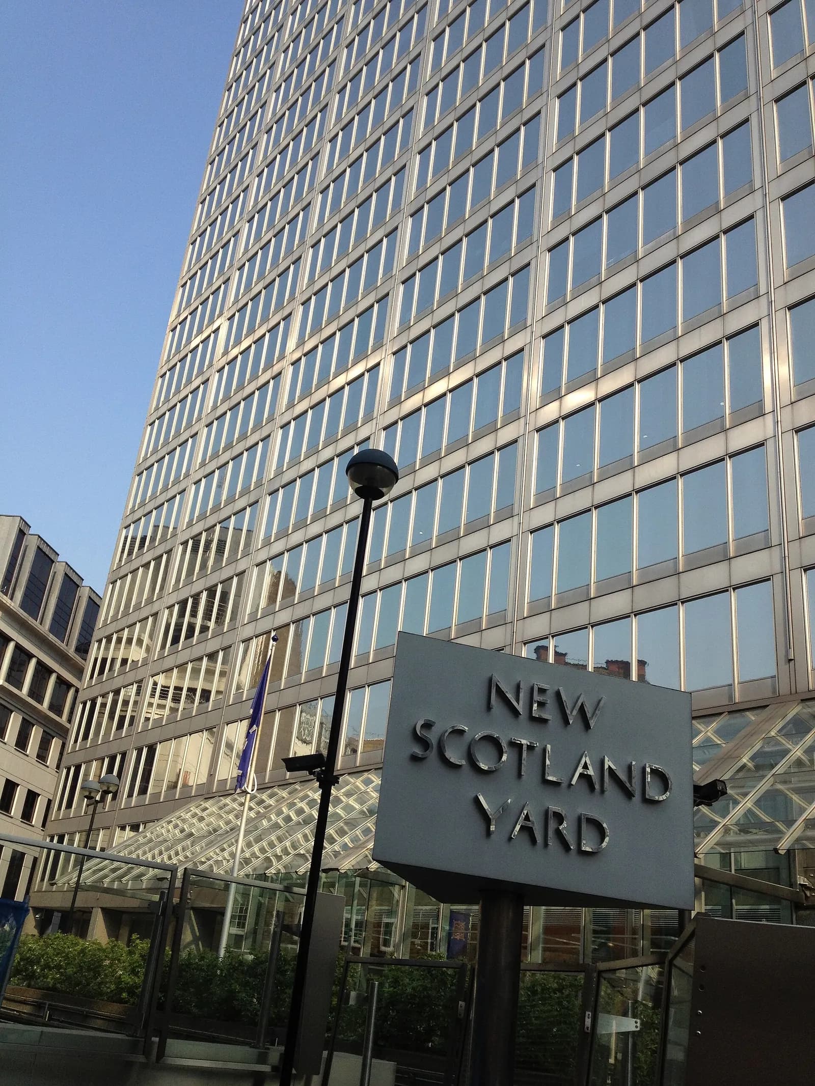 The Metropolitan Police sign and building at New Scotland Yard in London.