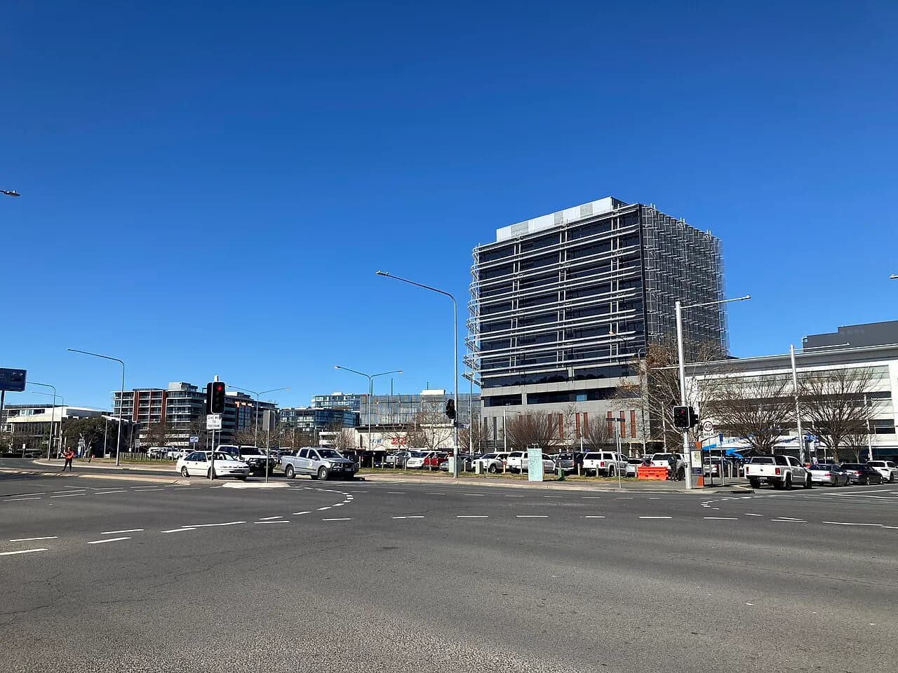 Street corner in Canberra’s Civic district, looking towards the Canberra Centre and a building housing ATO headquarters