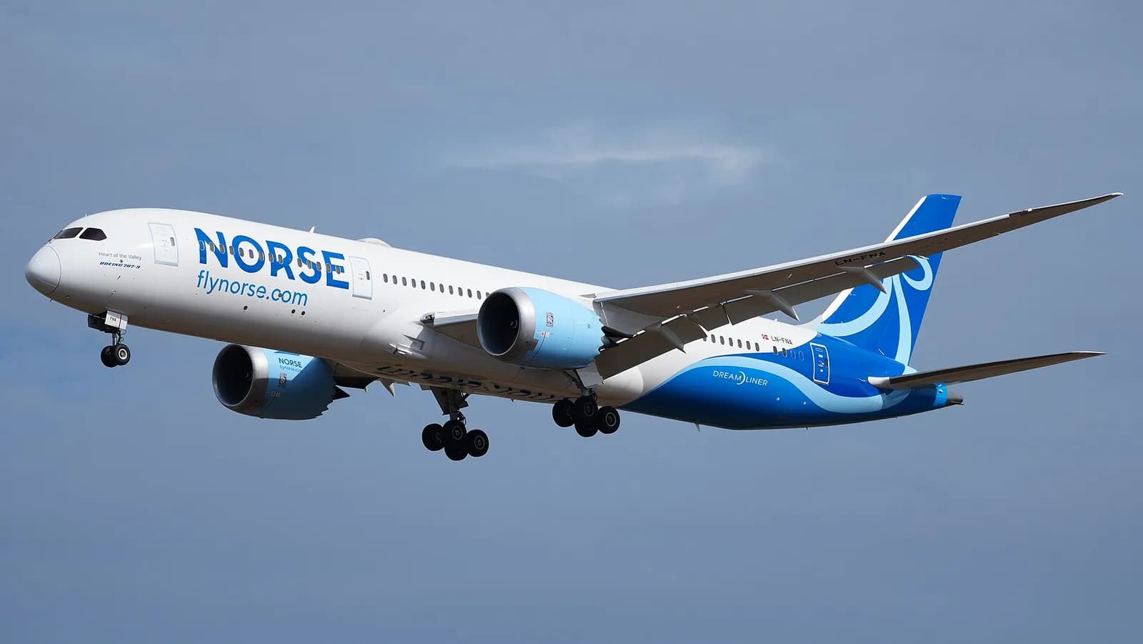 A Norse Atlantic Airways Boeing 787-9 Dreamliner approaches Berlin Brandenburg Airport.