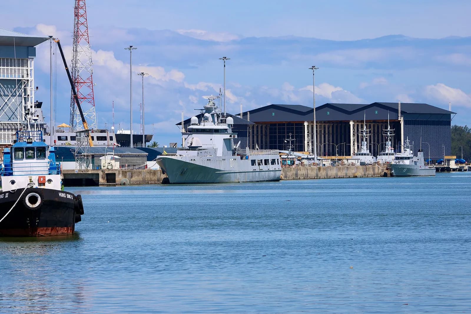 Muara Naval Base in Brunei, with patrol vessels at berth.