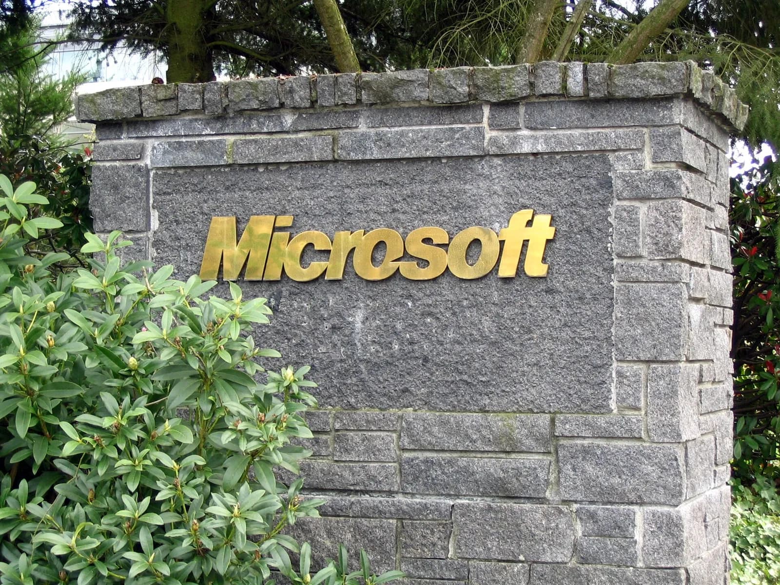 Stone sign bearing the Microsoft logo at the Redmond campus entrance.