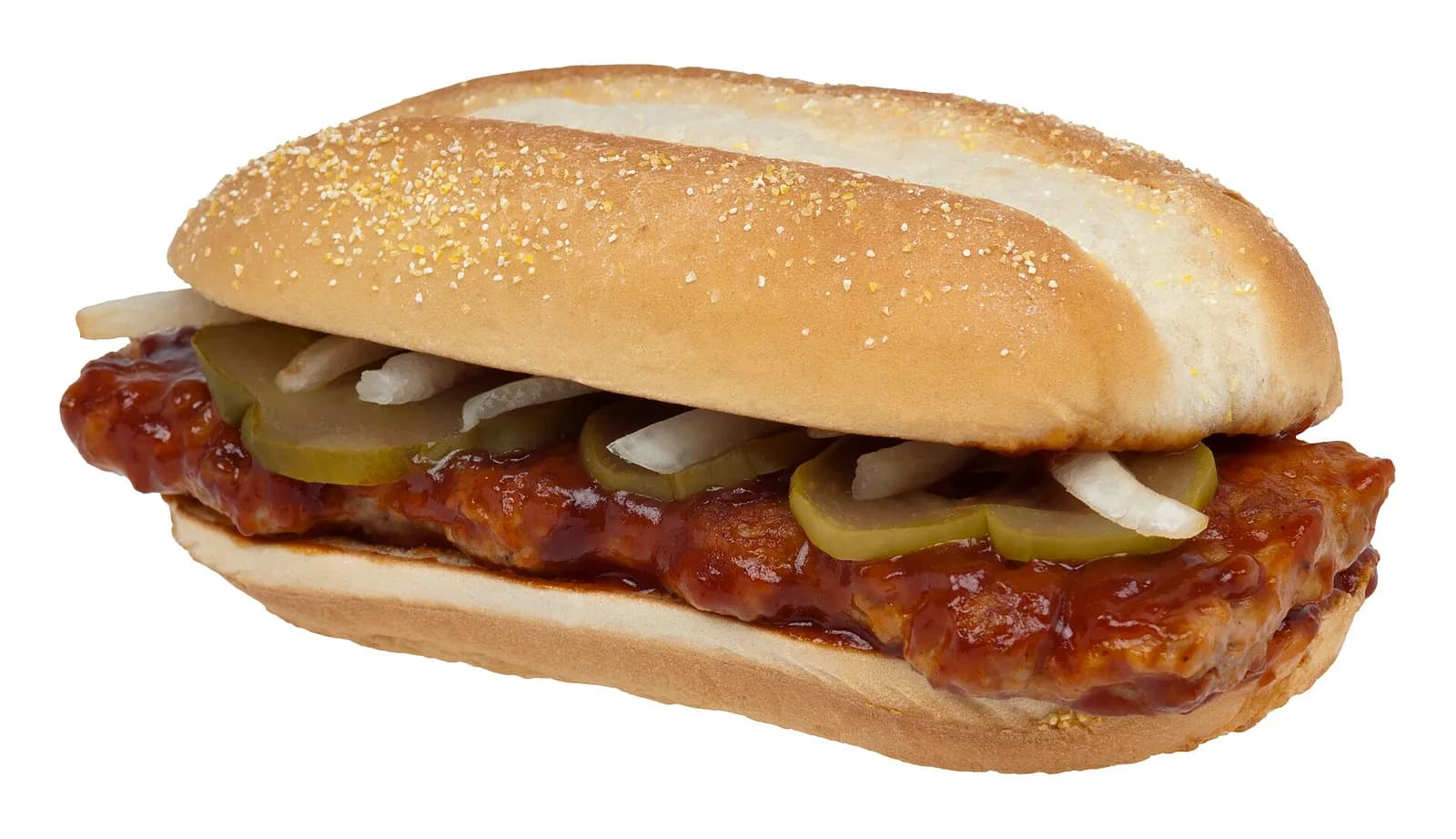 A McDonald’s McRib sandwich on a plain background.