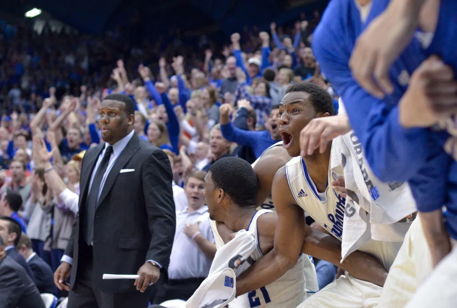 Kansas players and bench members react during a game against Texas at Allen Fieldhouse.