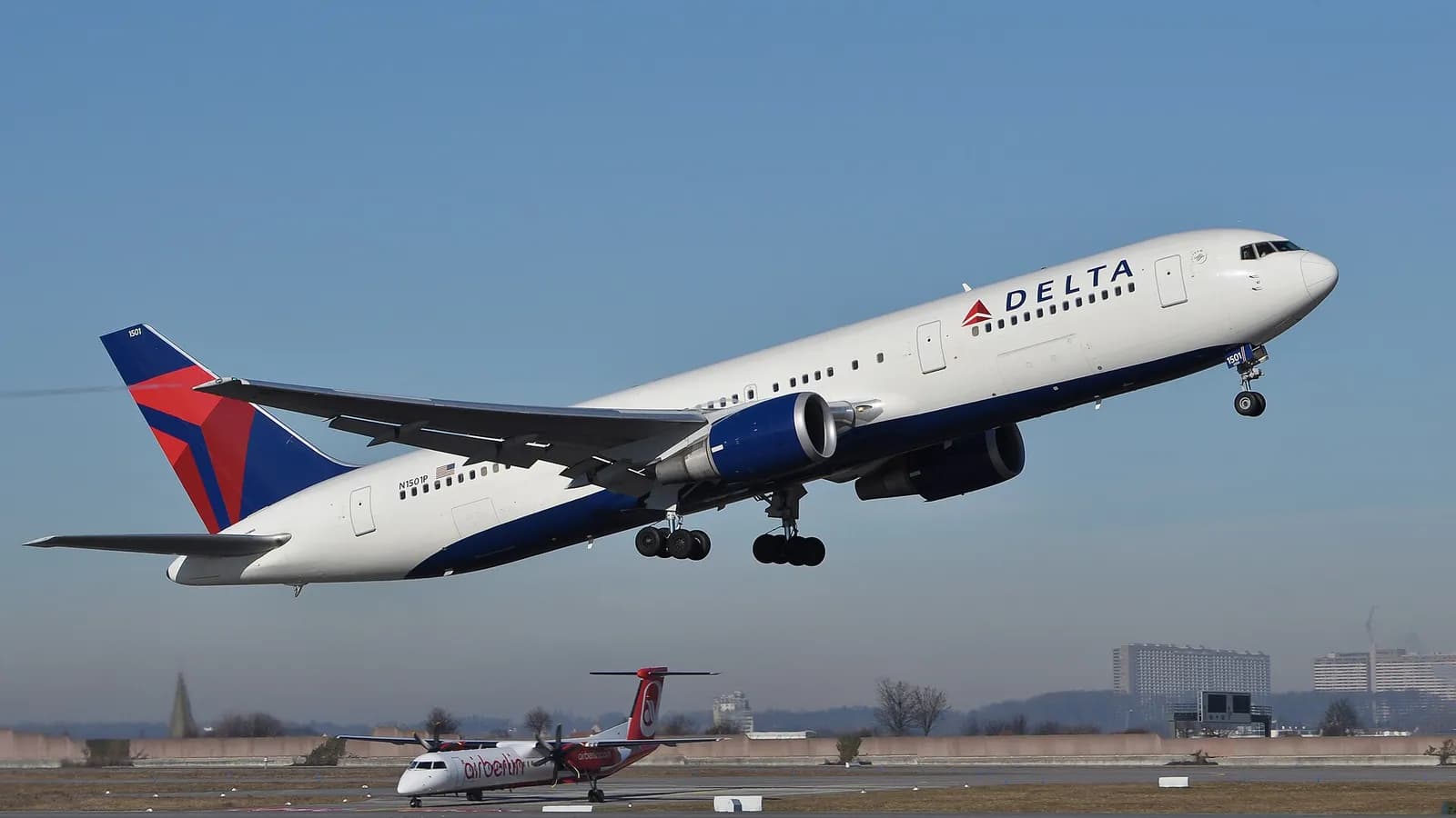 A Delta Air Lines Boeing 767 takes off at Stuttgart Airport.