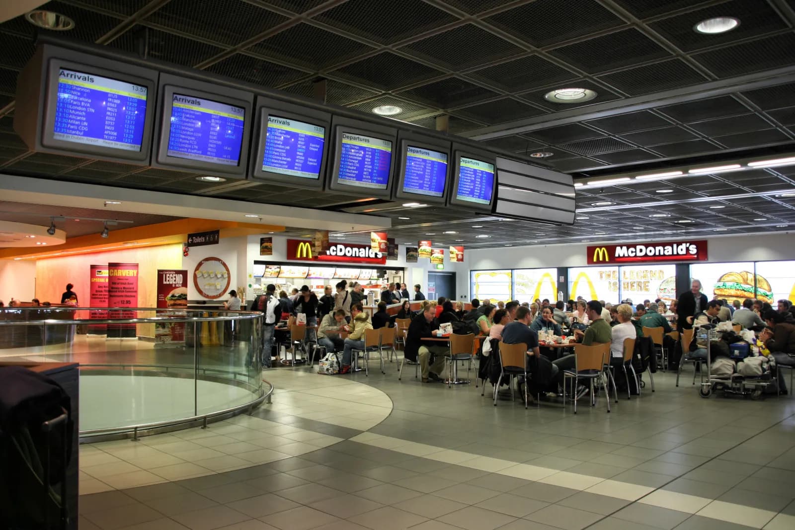 Interior of Dublin Airport’s departure area, with a McDonald’s restaurant.