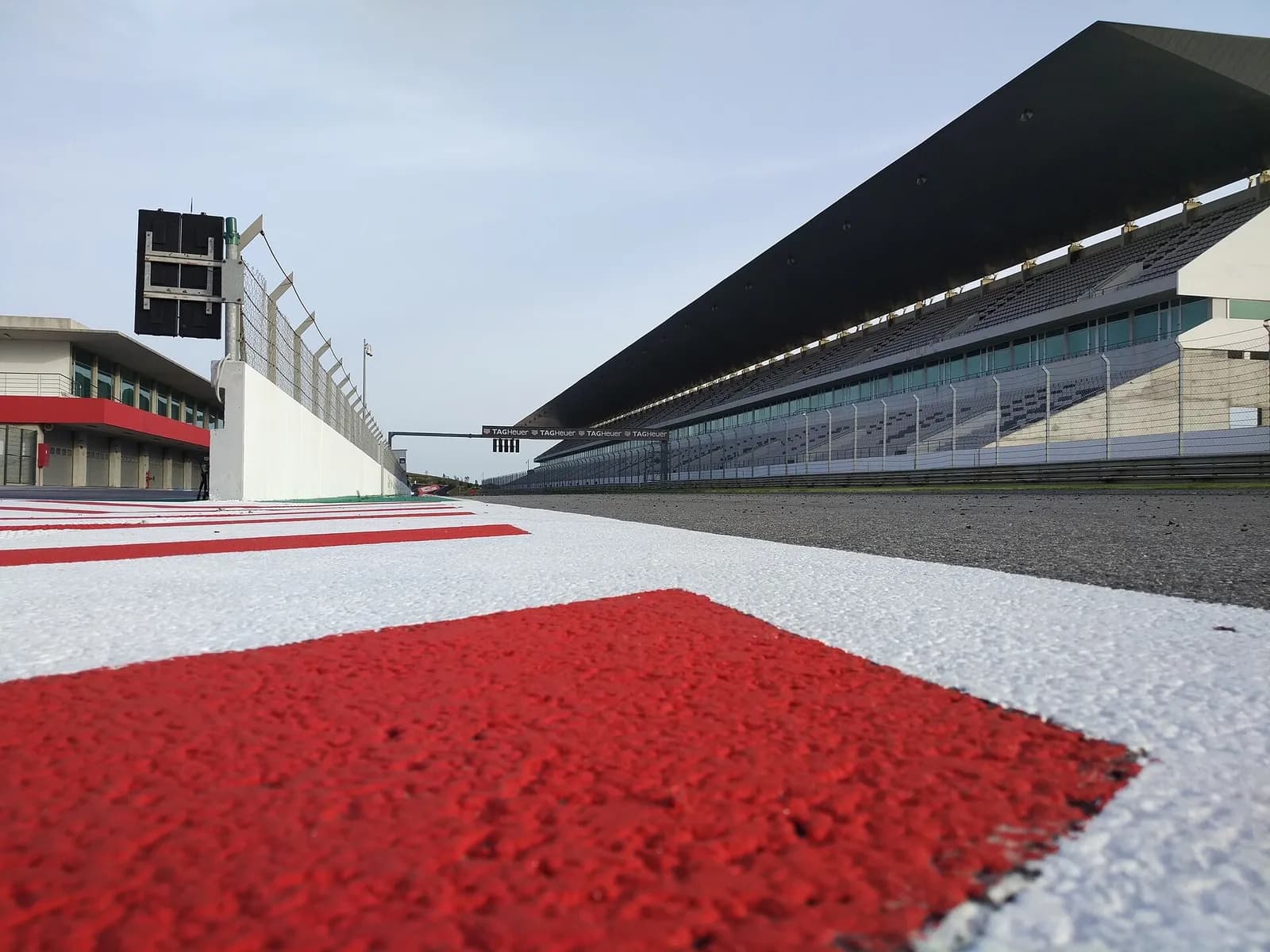 Ground-level view of the track and seating area at the Autódromo Internacional do Algarve.
