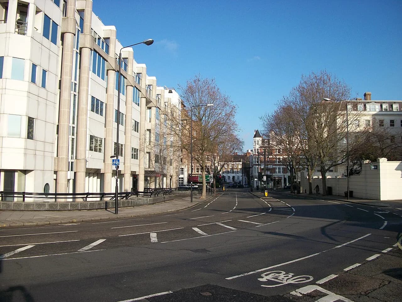 Quiet Drummond Gate in Pimlico, London, with office buildings along the street