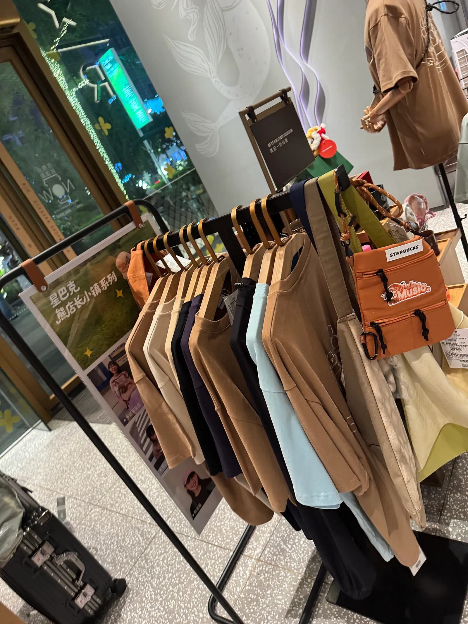 Clothing displayed inside a Starbucks store in Guangzhou, China.