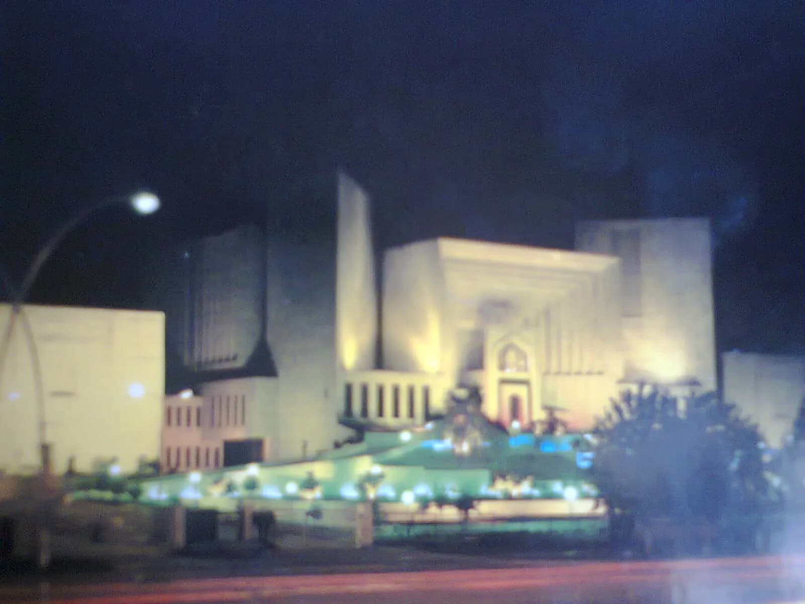The Supreme Court of Pakistan building at night in Islamabad.