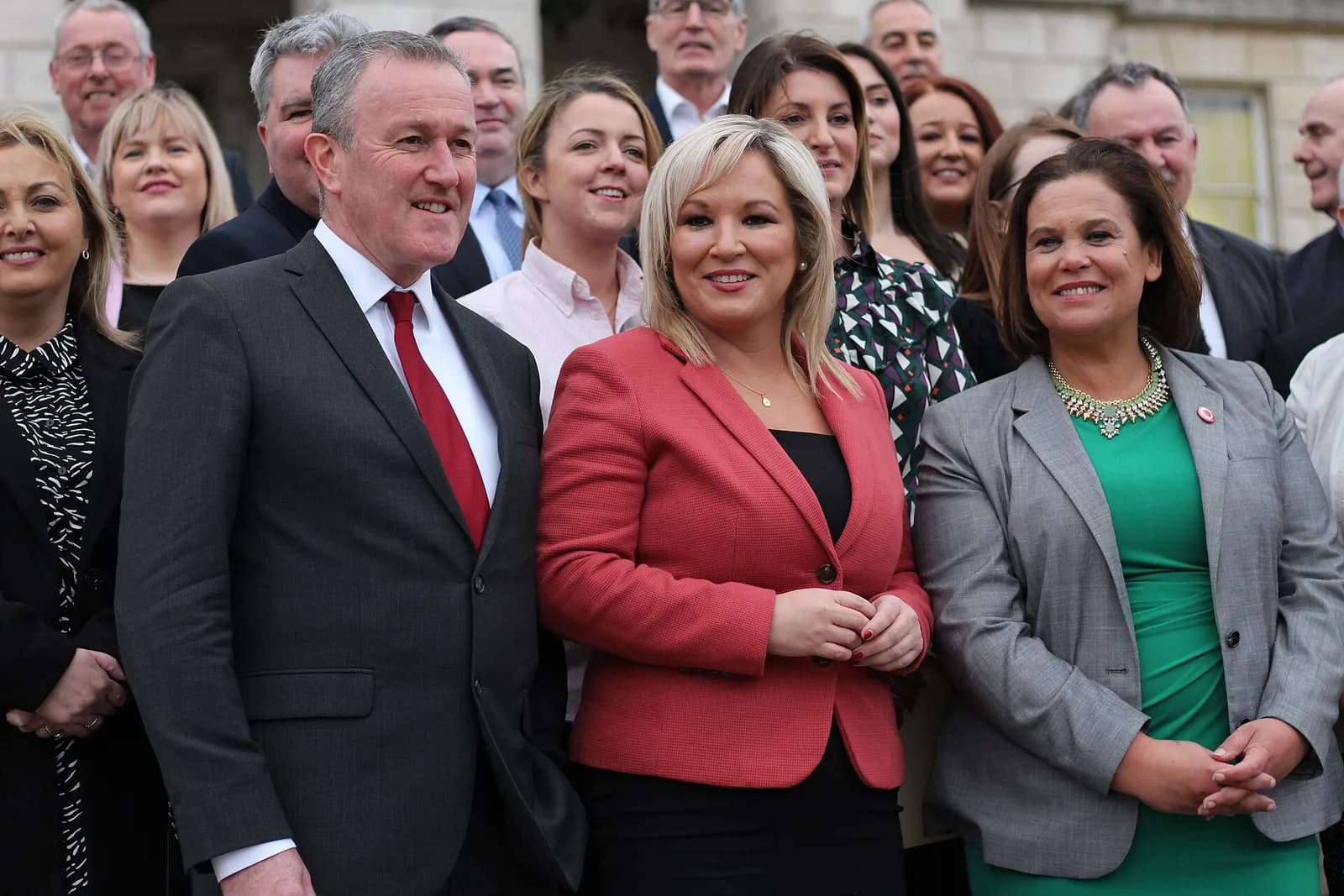 Sinn Féin president Mary Lou McDonald, Michelle O’Neill and Conor Murphy pose together.