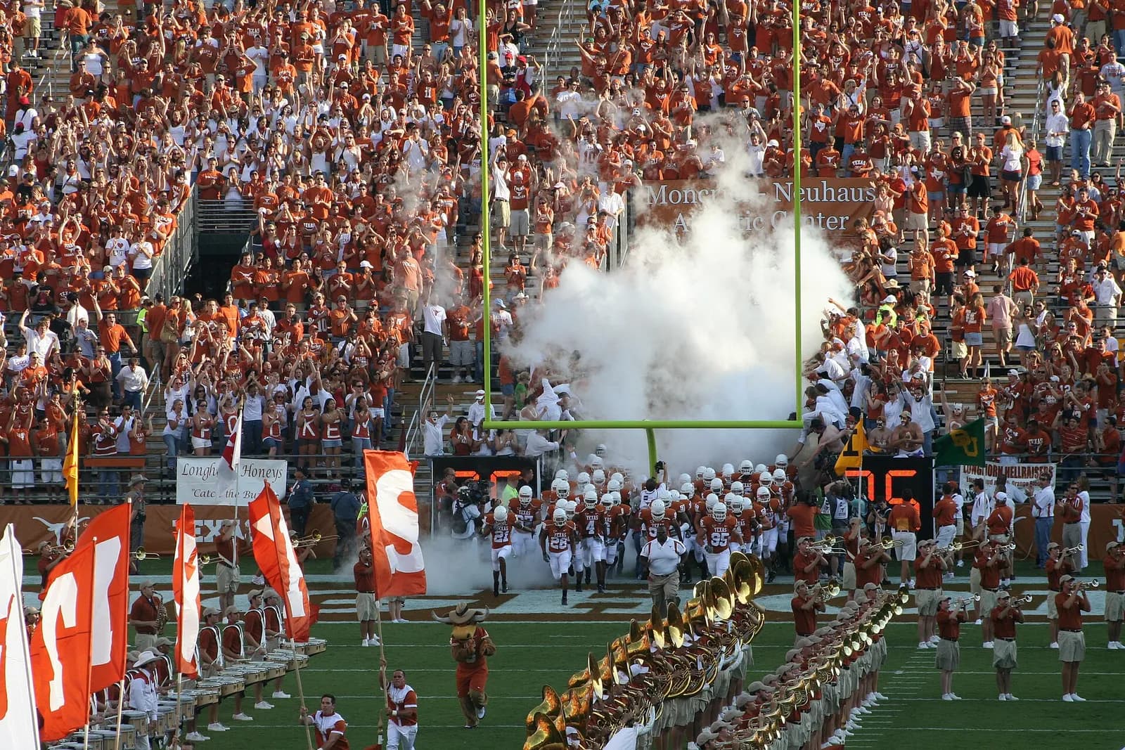 Texas Longhorns football team entering the field