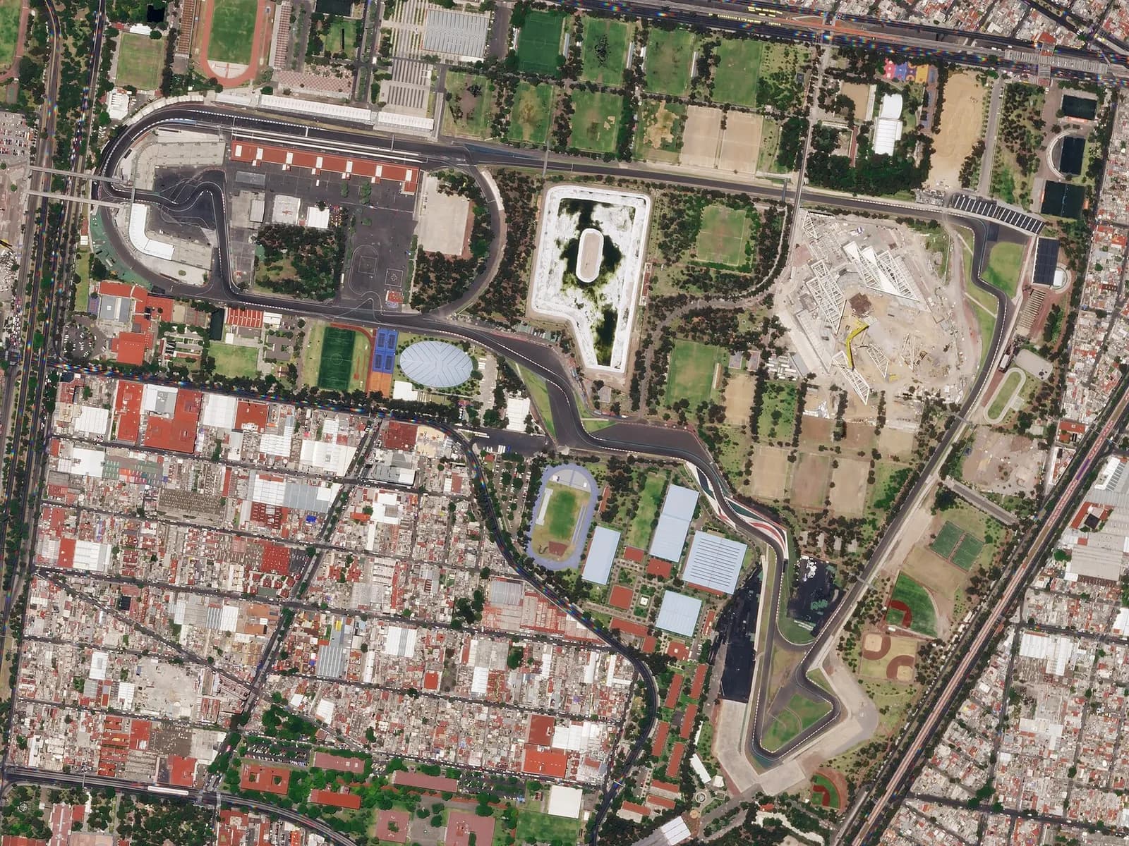 Aerial satellite view of the Autódromo Hermanos Rodríguez race circuit in Mexico City.