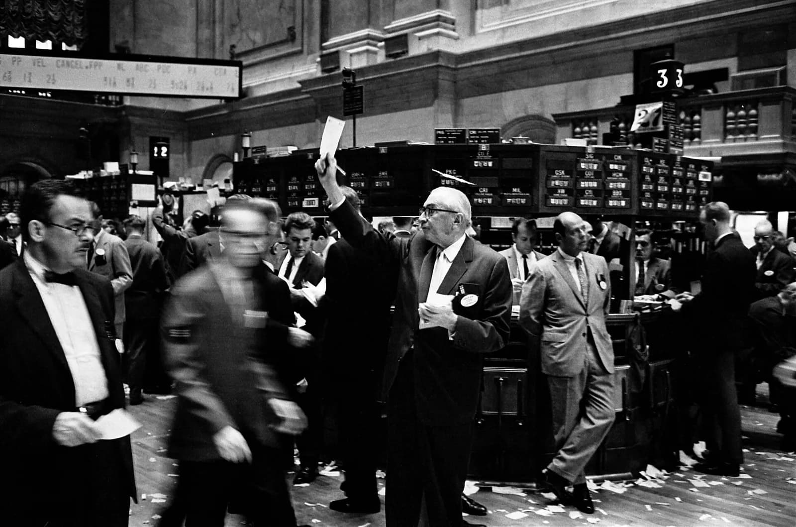 Stock brokers work on the New York Stock Exchange trading floor.