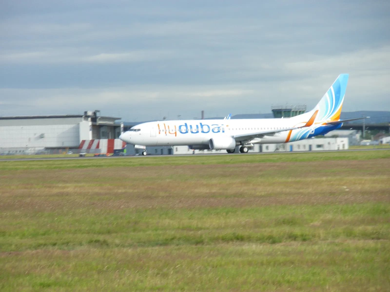 A Flydubai Boeing 737 parked at Glasgow Airport.