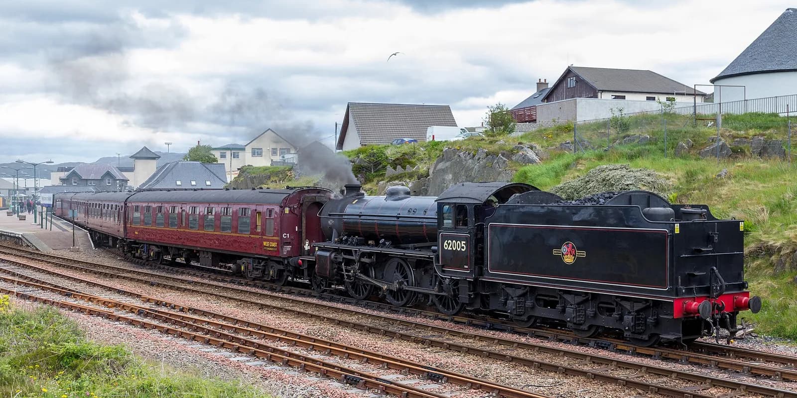 A steam train at Mallaig railway station in Scotland.