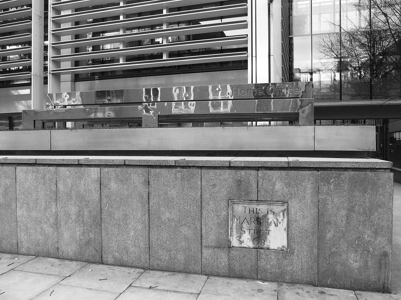 Black-and-white photograph of the Home Office building on Marsham Street in London.