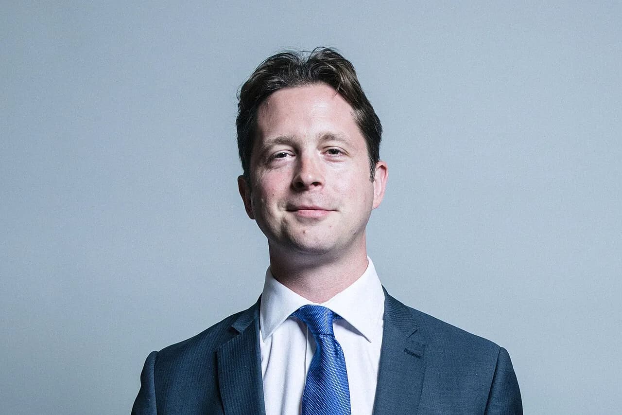 Alex Burghart in an official portrait photographed in 2017.