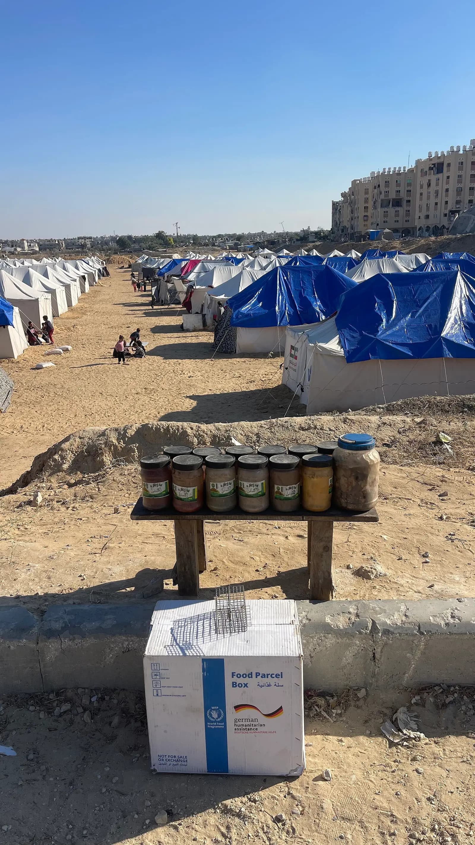 Food aid being provided to residents of tents in Gaza during the 2023–2025 war.