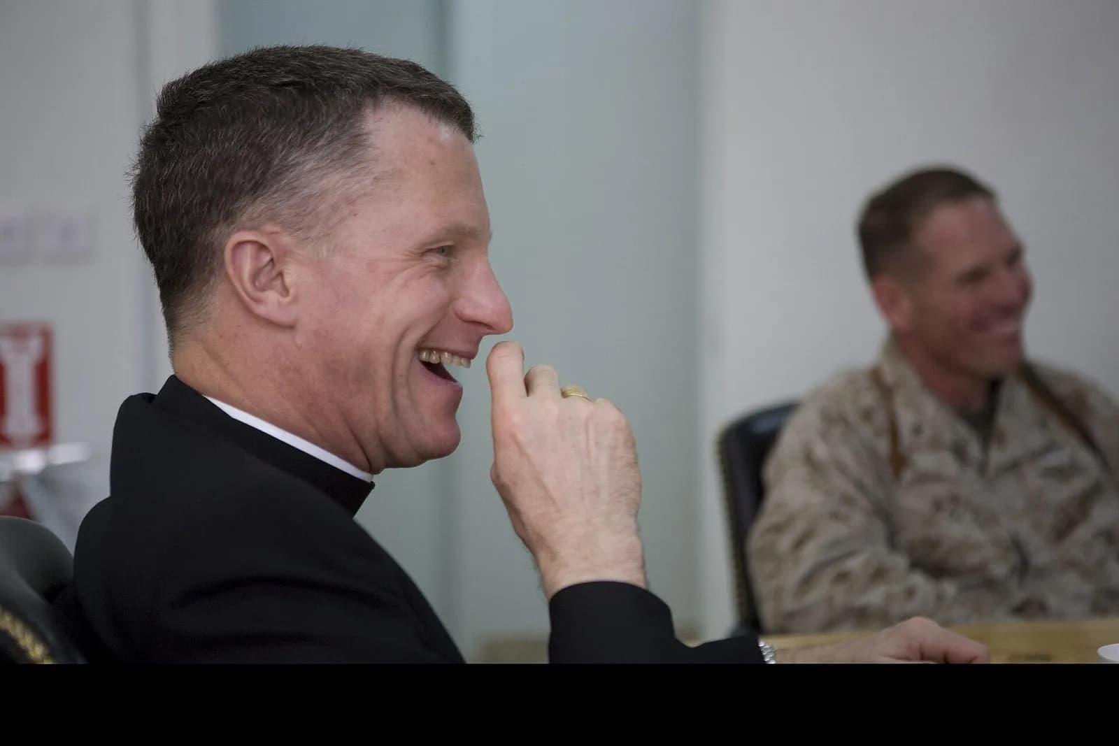 Archbishop Timothy P. Broglio visits Marines at Al Asad Airbase.