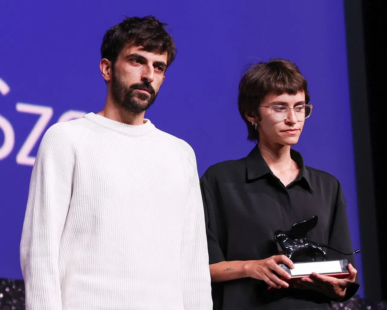 NAZA directors Yuval Abraham and Rachel Szor holding the Special Jury Prize at the Venice Film Festival