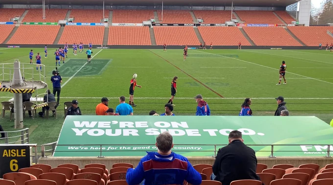 Waikato Mana and Akarana Falcons players compete in a rugby league game at Waikato Stadium.