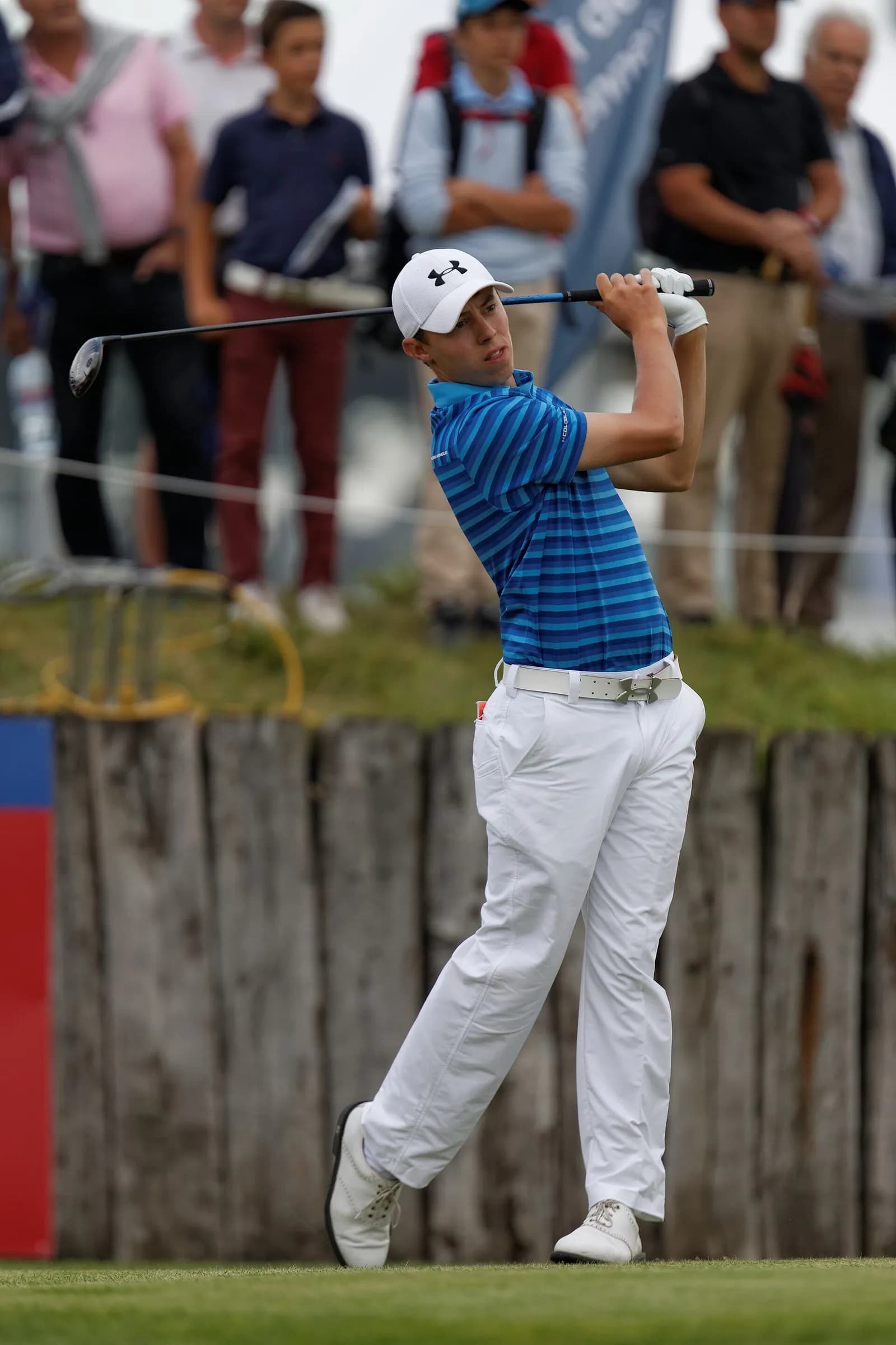 Matt Fitzpatrick on a golf course during the 2014 French Open at Le Golf National