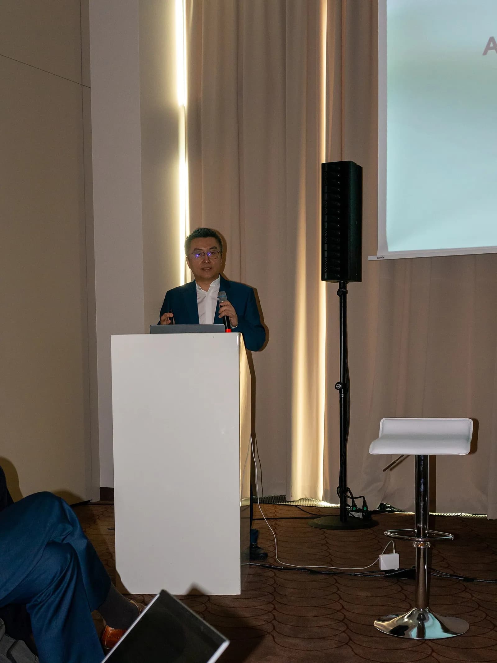 Xpeng president Brian Gu speaking at the company’s IAA Mobility 2023 press conference in Munich.