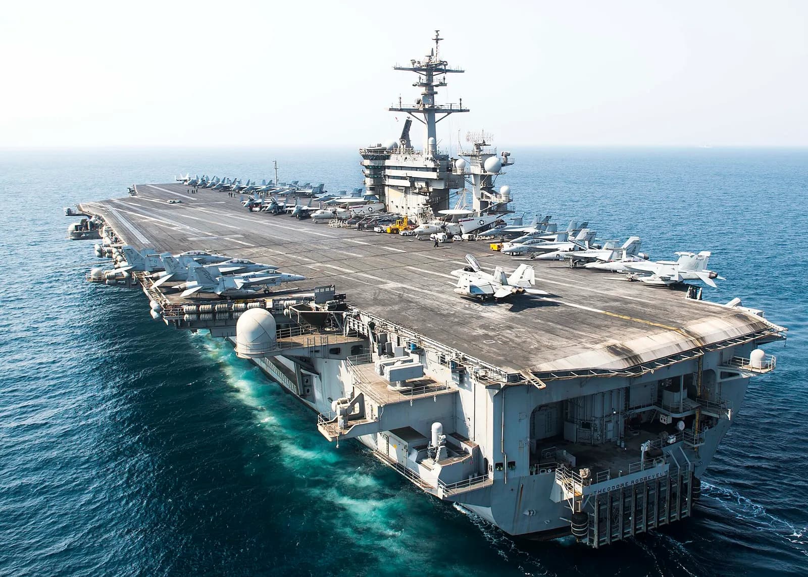The aircraft carrier USS Theodore Roosevelt sailing in the Arabian Gulf.