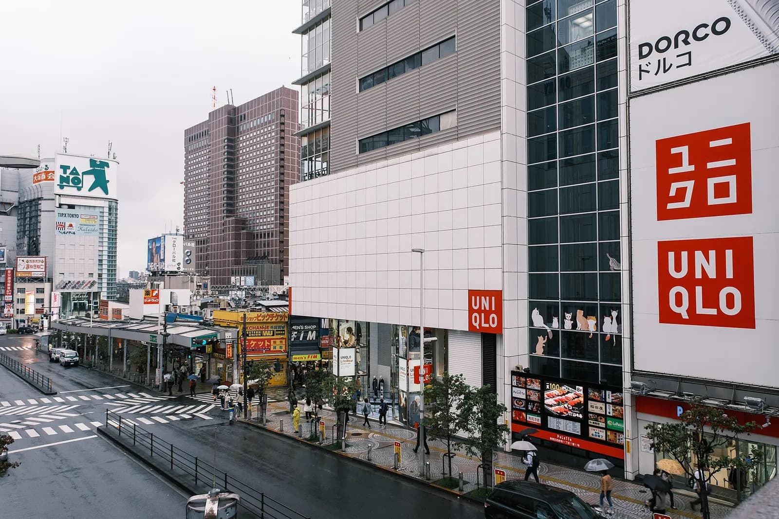 Uniqlo storefront on a city street in Shinjuku, Tokyo