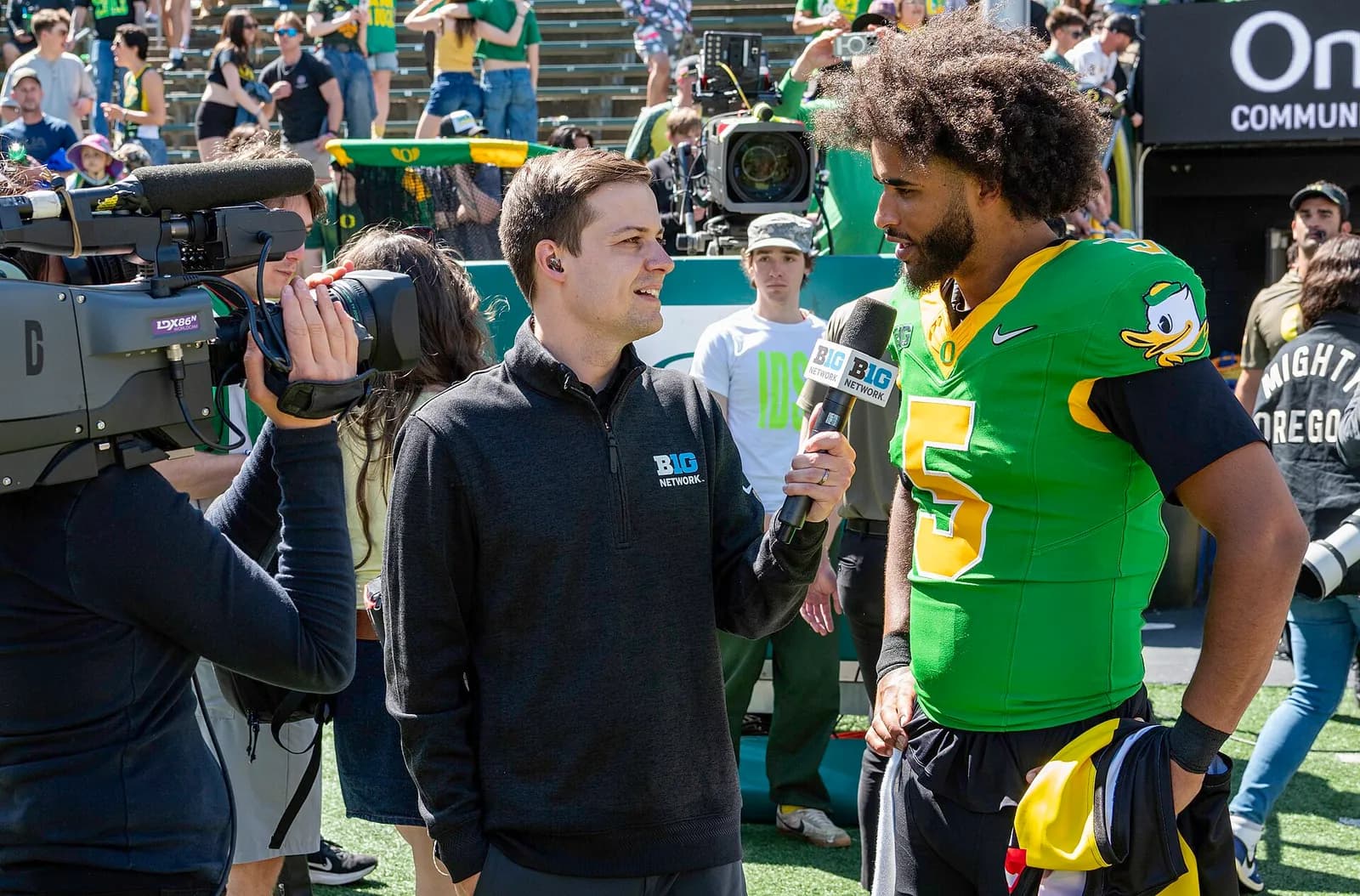Oregon Ducks quarterback Dante Moore is interviewed after the team’s spring football game.