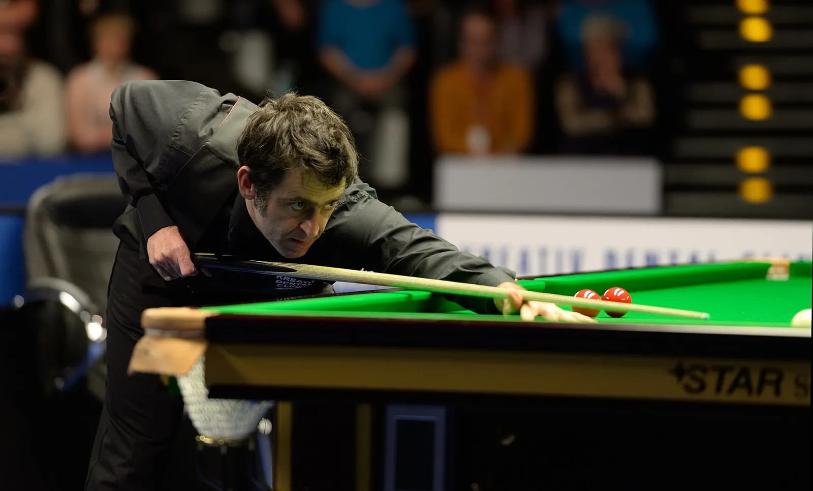 Ronnie O’Sullivan plays a shot at the German Masters in Berlin.