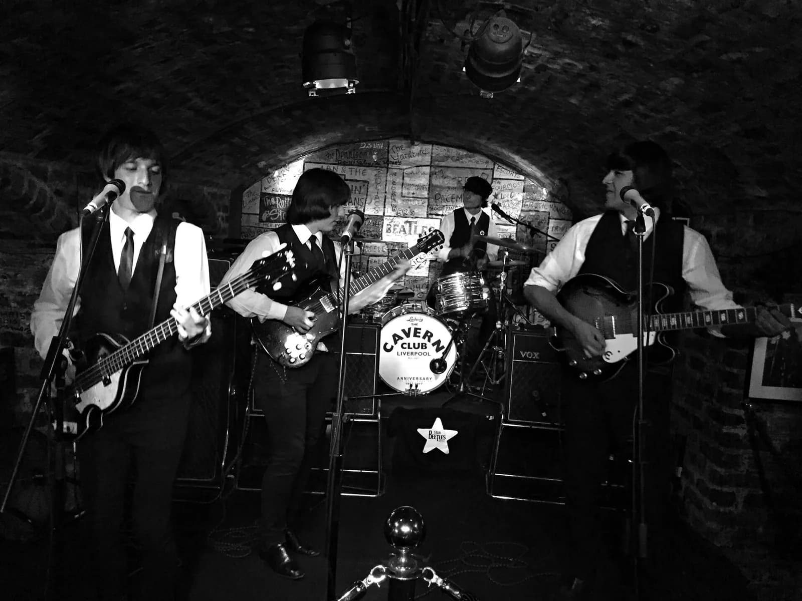 A band performs on the stage inside the Cavern Club in Liverpool.