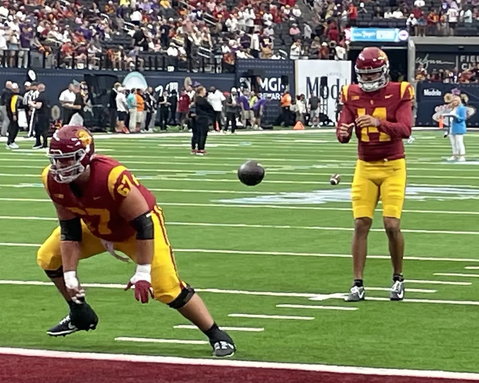 USC quarterback Jayden Maiava prepares for a play during a football game.