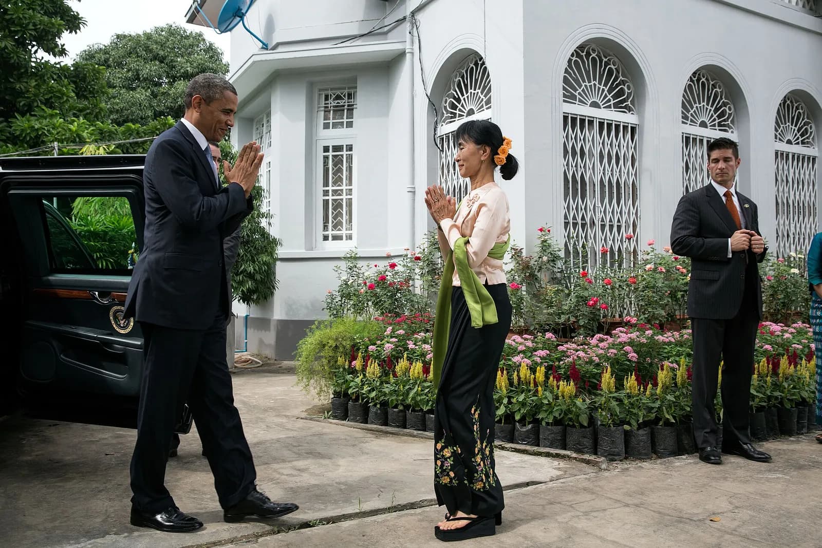 Aung San Suu Kyi greets Barack Obama at her home in Rangoon.