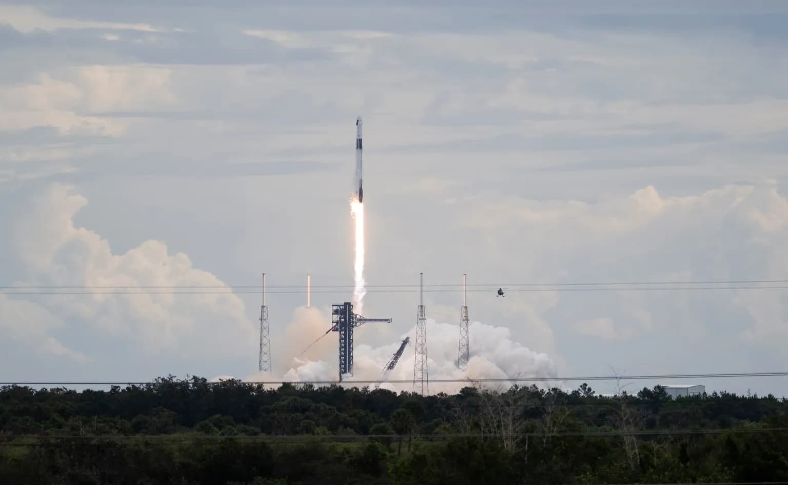 A SpaceX Falcon 9 rocket carrying the Crew-13 Dragon spacecraft launches from Cape Canaveral, Florida.
