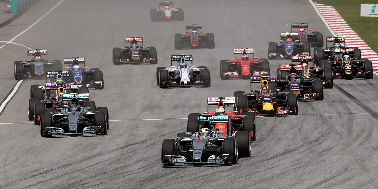 Formula One cars on the opening lap of the 2015 Malaysian Grand Prix at Sepang