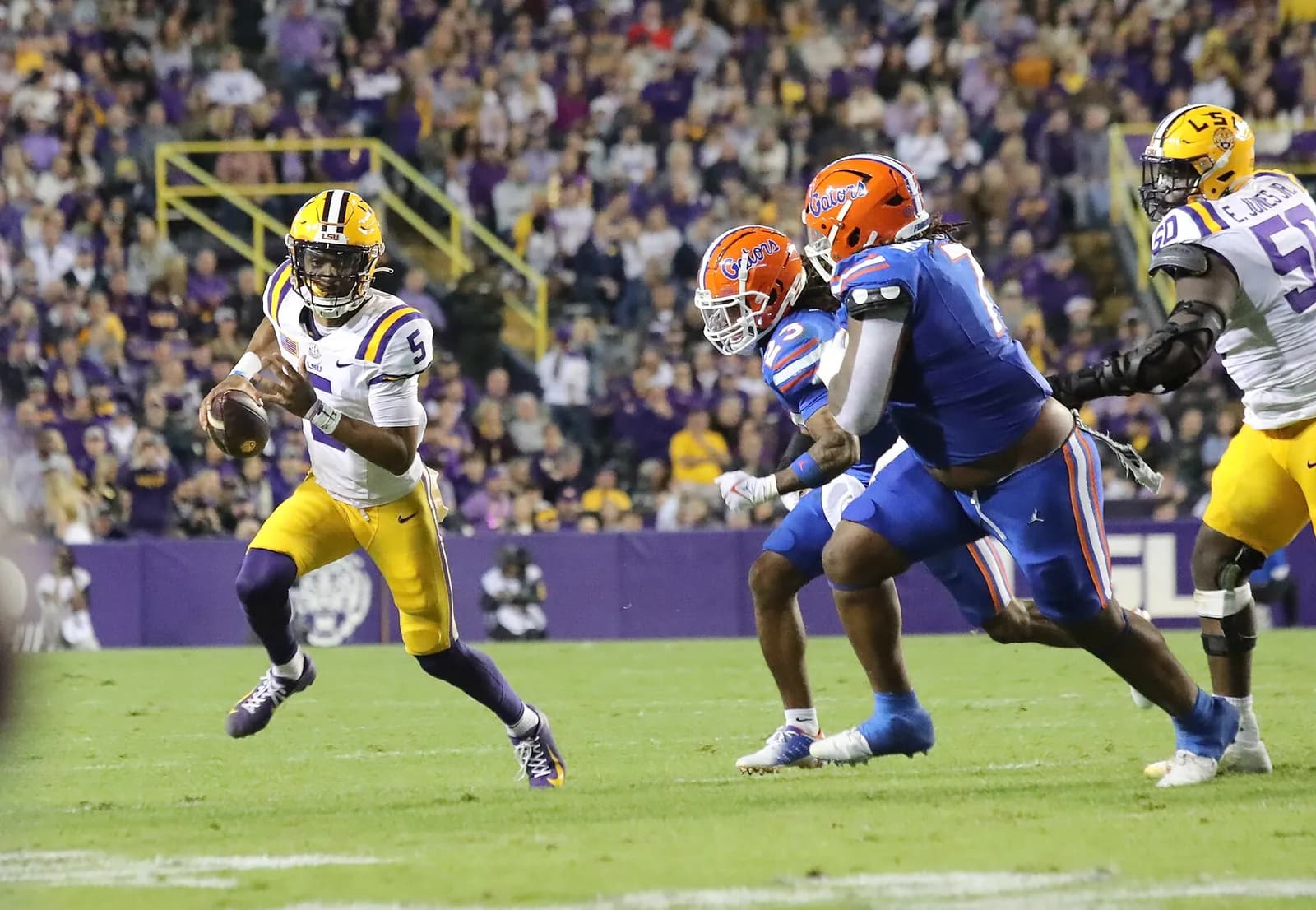 Florida Gators and LSU Tigers players during a football game at Tiger Stadium.