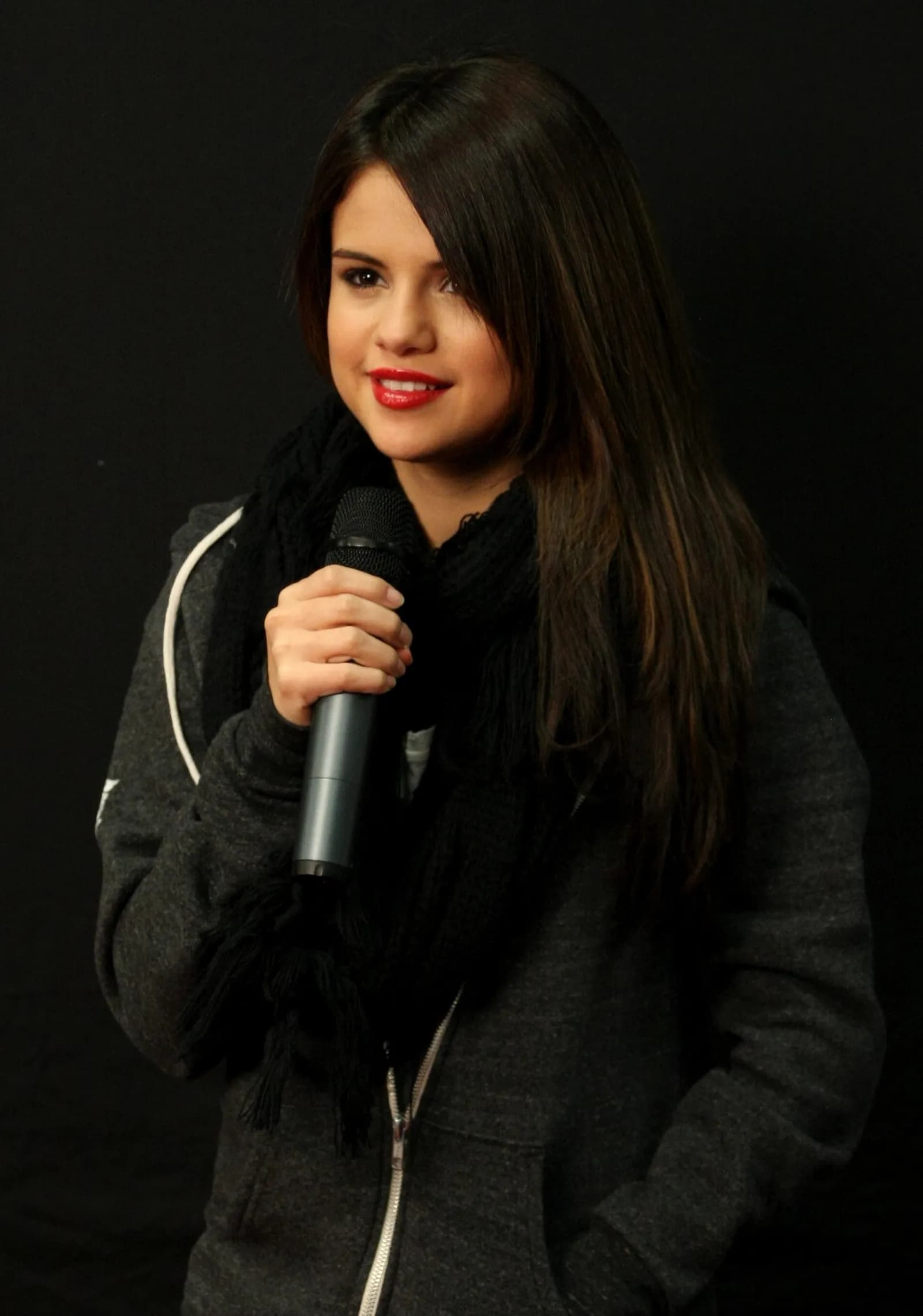 Selena Gomez performing live on stage.