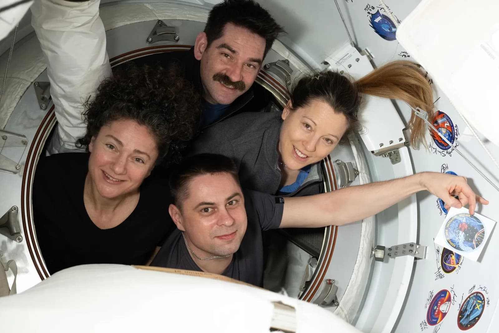 Crew-12 astronauts Jessica Meir, Jack Hathaway, Sophie Adenot and Andrey Fedyaev pose together aboard the International Space Station.