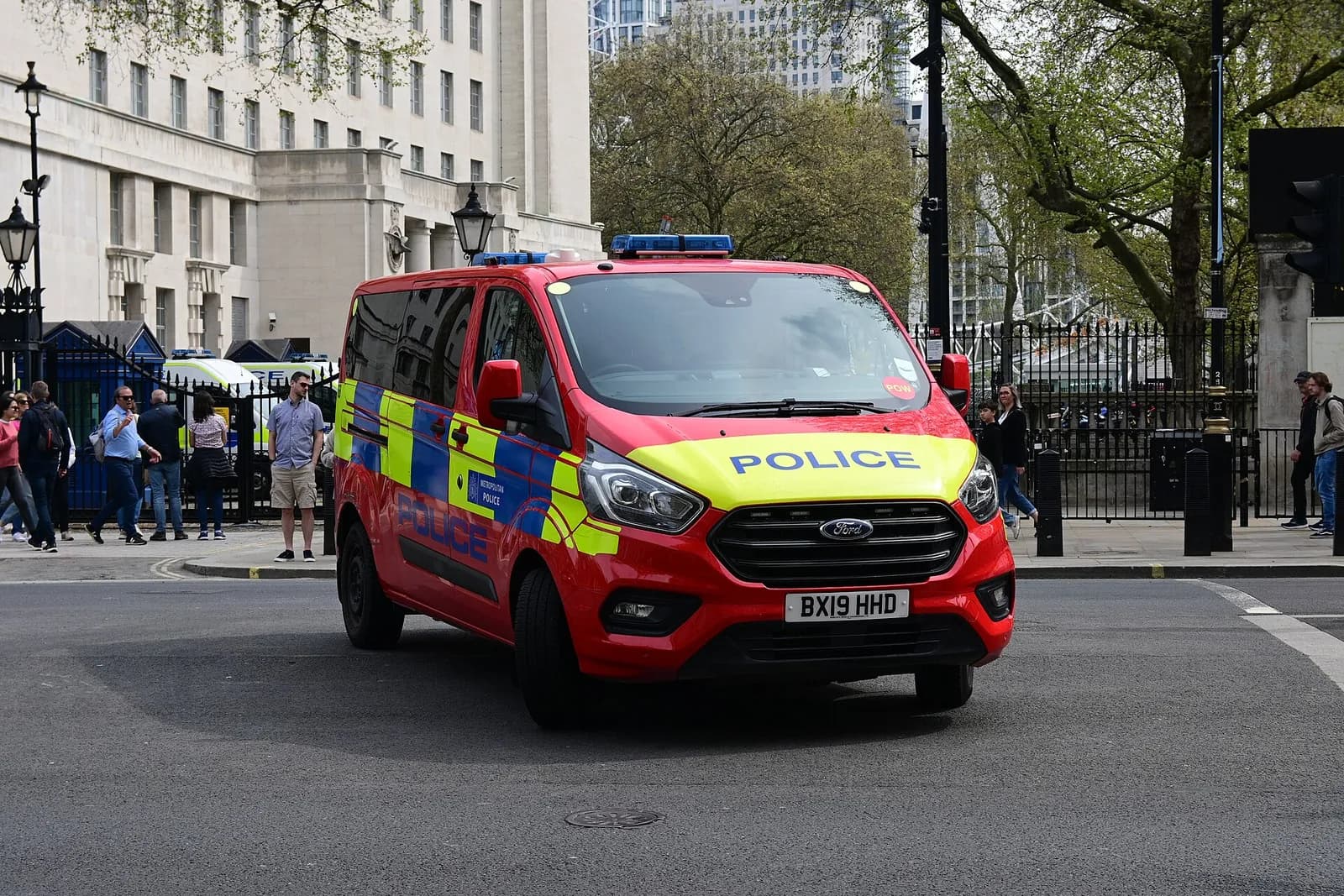 A Metropolitan Police Diplomatic Protection Group Ford Transit Custom van on Whitehall.