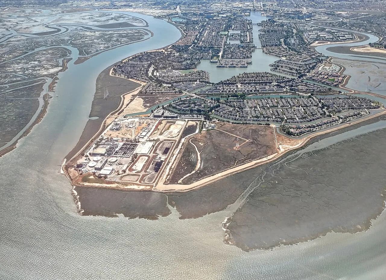 Aerial view of the Silicon Valley Clean Water treatment plant beside San Francisco Bay in Redwood City, California.
