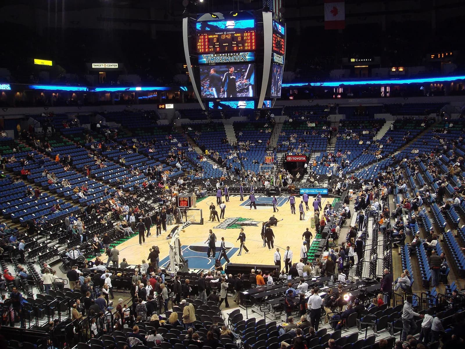 Pre-game warm-ups on the basketball court at Target Center.