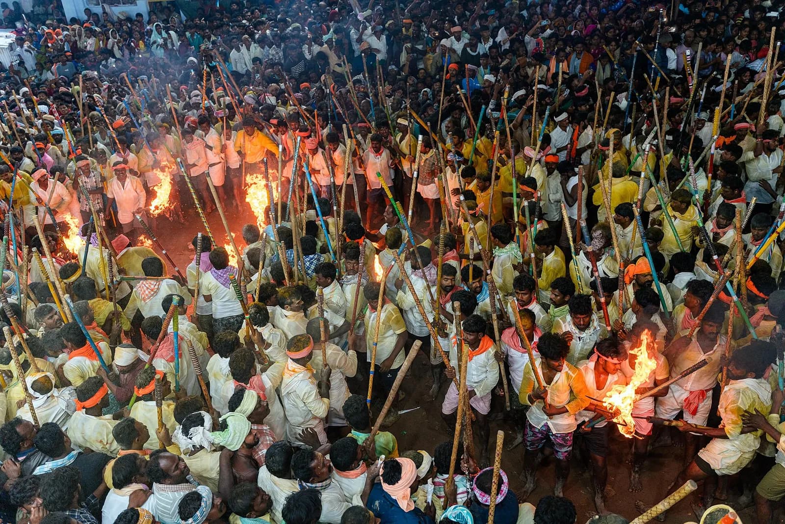 Devotees take part in the Banni Festival stick fight.